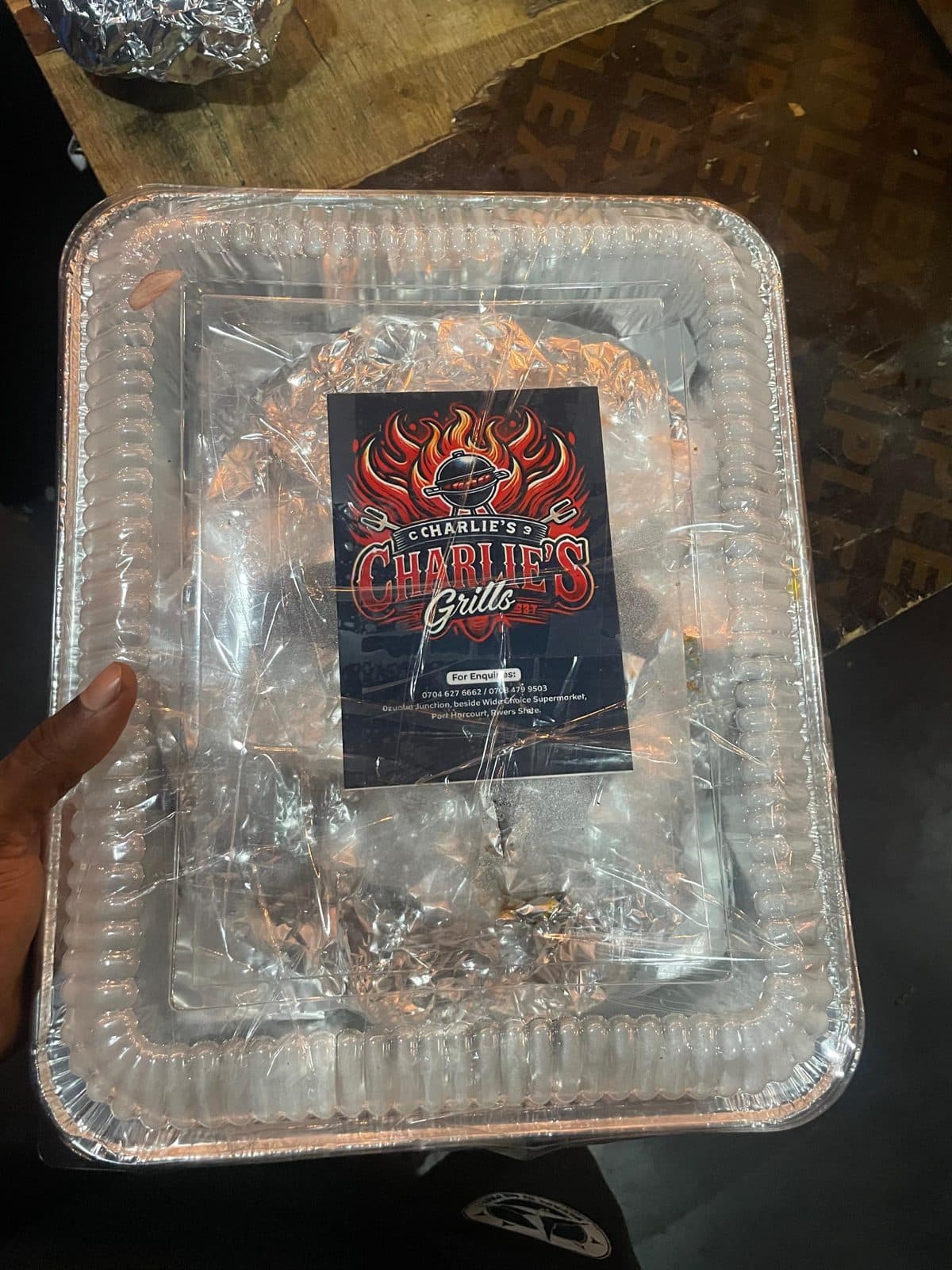 Sealed Charlie's Grill takeaway tray